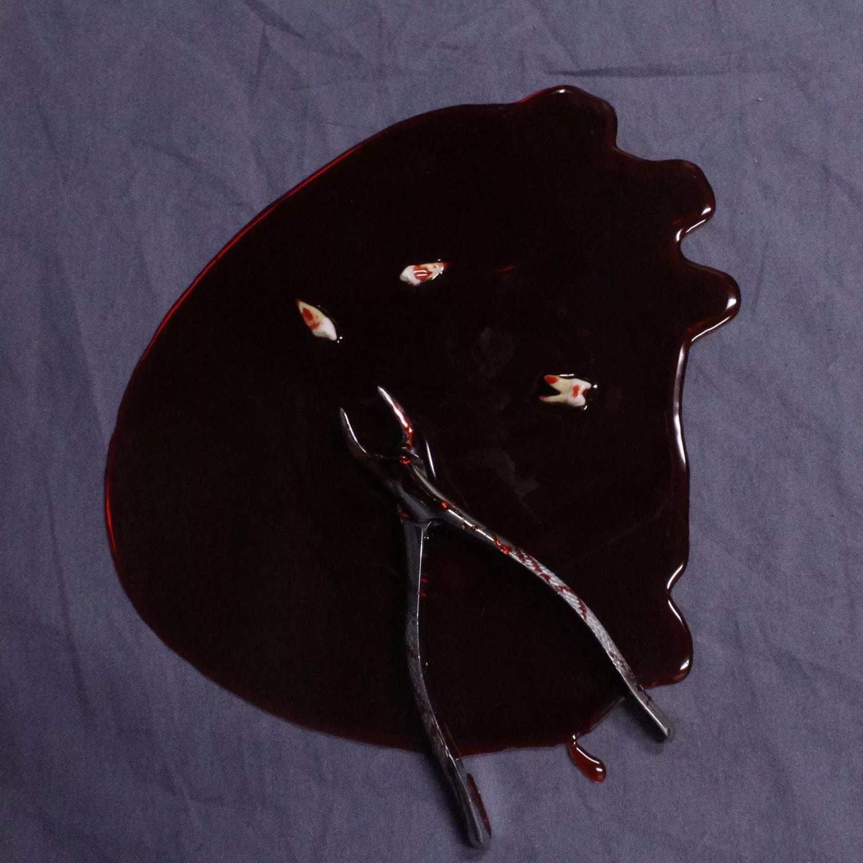 Blood Pool with Teeth and Tooth Extractor